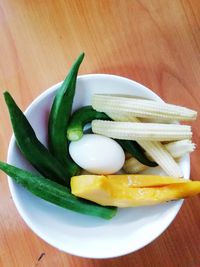 High angle view of fruits in plate on table