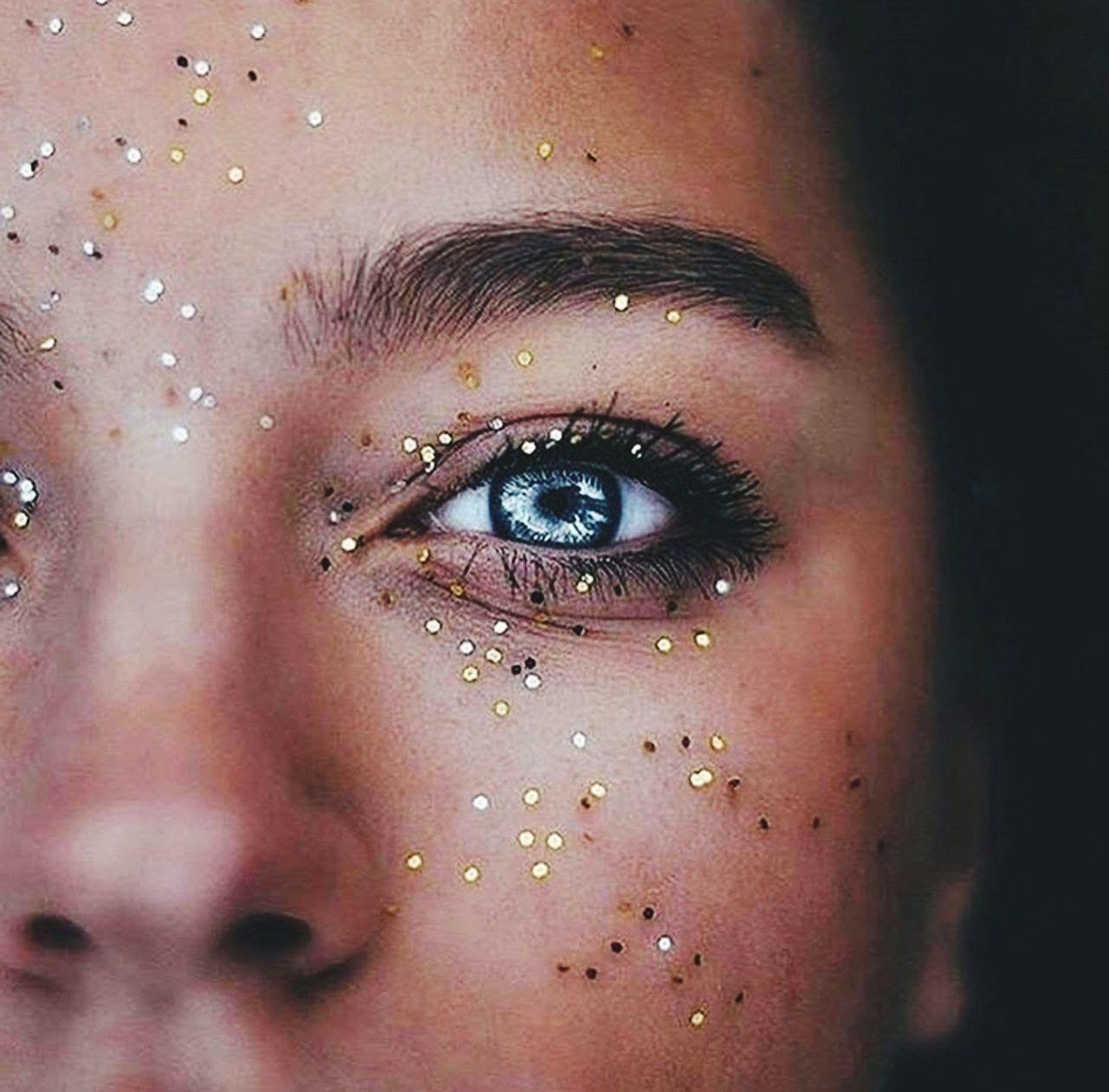 CLOSE-UP PORTRAIT OF A WOMAN WITH EYES