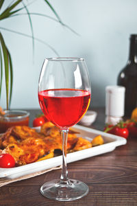 Close-up of wineglass on table