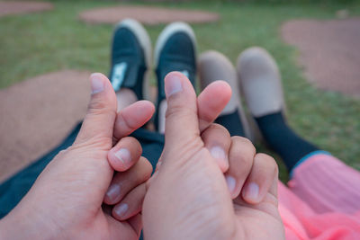 Close-up hands snapping fingers