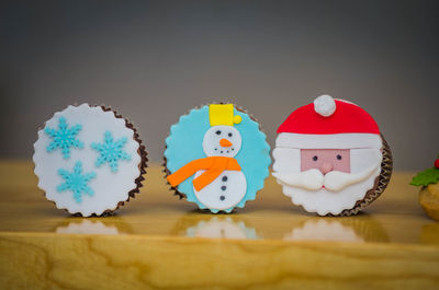 Close-up of christmas cookies on wooden table