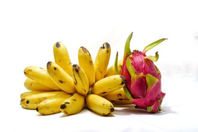 Close-up of fruit against white background