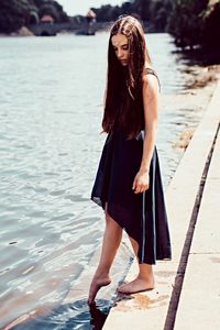 Woman standing in water