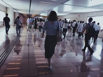 Group of people walking in airport