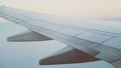 Scenic view of aircraft wing through window