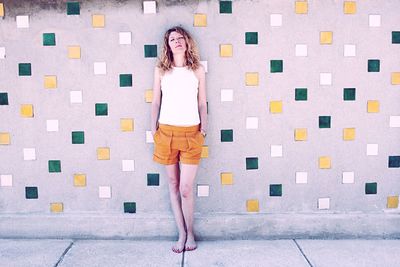 Close-up of woman standing in pond