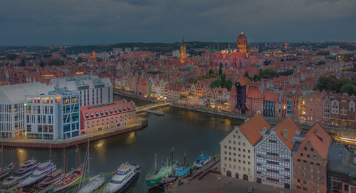 High angle view of river amidst buildings in town