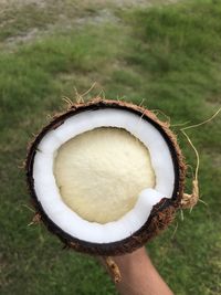 Close-up of hand holding dessert