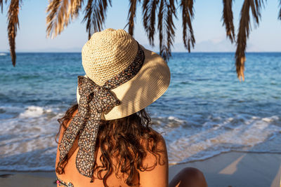 Woman relaxing at a beach.