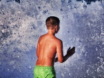 Man playing in swimming pool