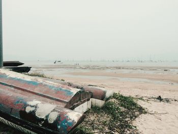 Scenic view of beach against clear sky