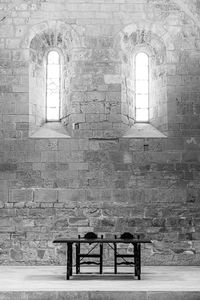 Empty benches in old building