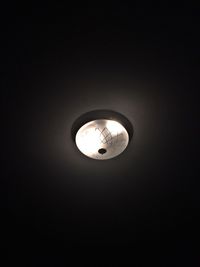 Low angle view of illuminated lamp