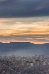 High angle view of townscape against sky during sunset