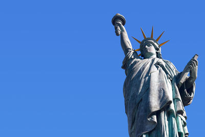 Replica of the statue of liberty in paris, near the eiffel tower.