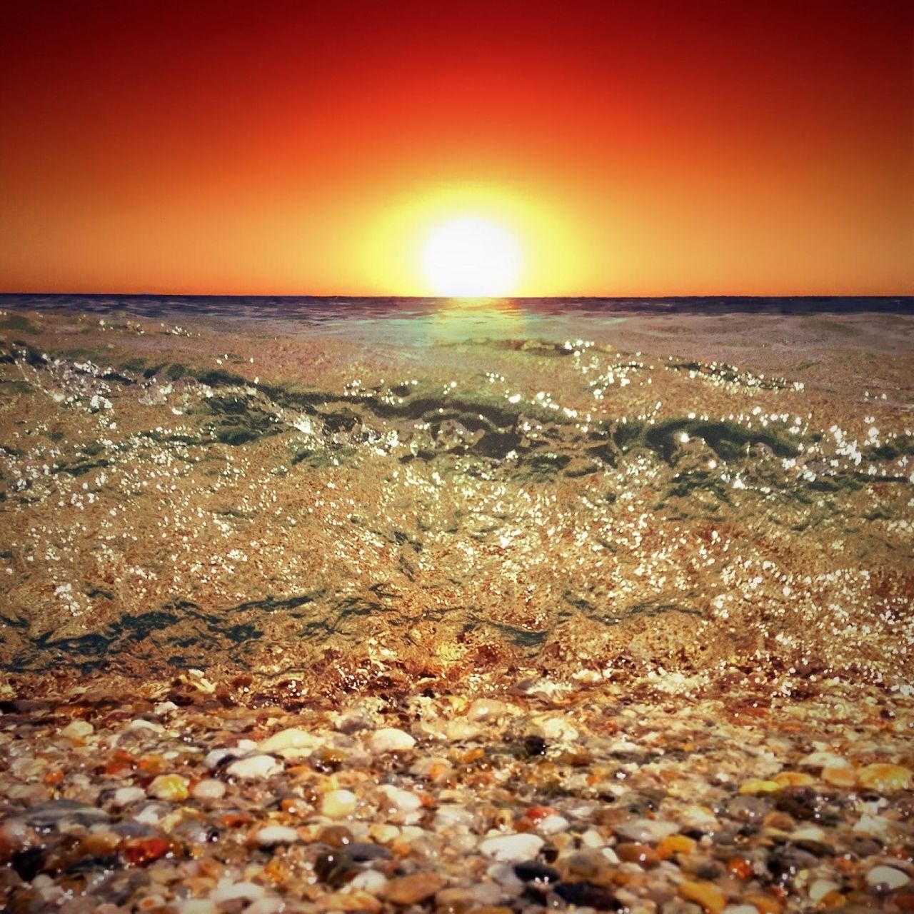 sunset, water, sea, scenics, beach, beauty in nature, horizon over water, tranquil scene, orange color, tranquility, sun, shore, nature, idyllic, wave, sky, reflection, clear sky, sunlight, remote