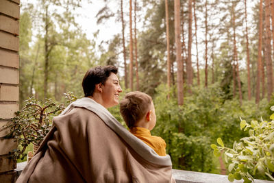 Happy grandmother and grandson enjoy time together. positive middle age woman 