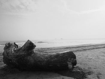 View of calm beach against the sky