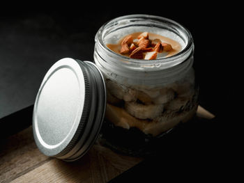 High angle view of dessert in jar on table