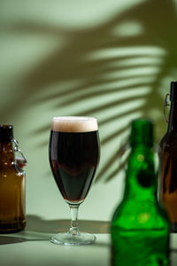 Close-up of beer glass on table