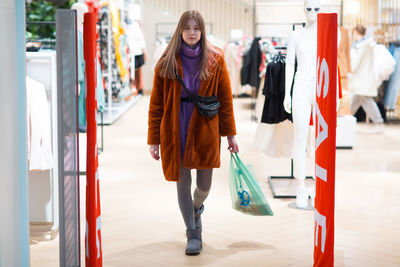 Full length of woman walking outdoors