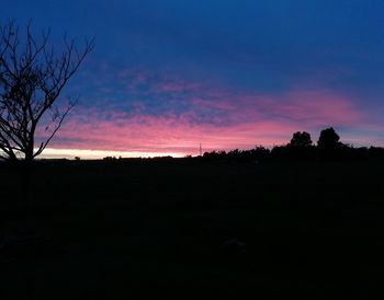 Scenic view of silhouette landscape against sky during sunset