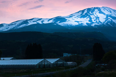 Scenic view of snow covered mountains