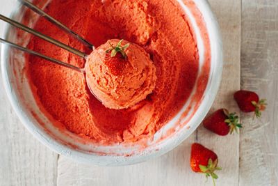 Directly above shot of strawberry ice cream in bowl