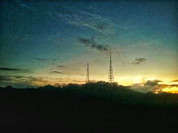 Scenic view of landscape against sky at sunset