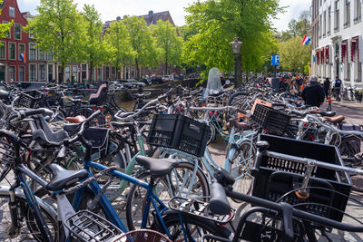 Netherlands, a busy day in the city center of the city during king's day. bicycles parking 