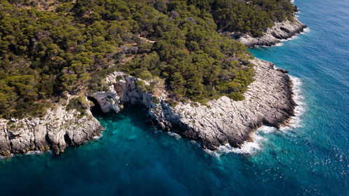 High angle view of rocks on sea