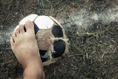 Low section of person on soccer field