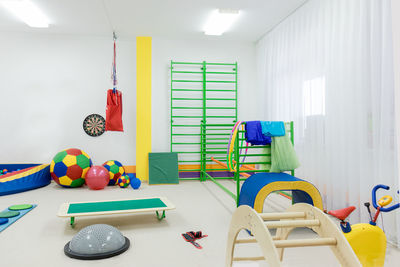 Skittles, skipping ropes, mats and educational toys, leg stretchers. equipping the sensory 