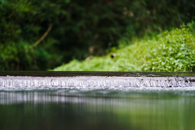 Surface level of water flowing over land