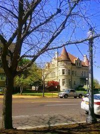 Buildings in city against sky