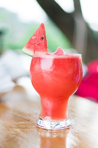 Close-up of red fruit on table