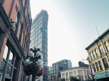 Low angle view of buildings against clear sky