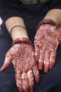 Close-up of woman hand with tattoo