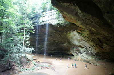 Tourists on rock