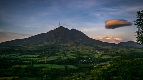 Scenic view of mountains against sky during sunset