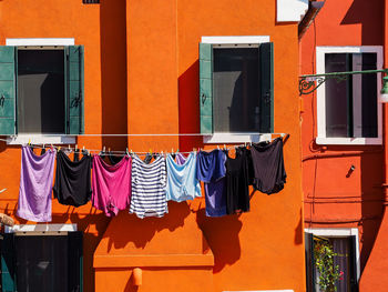 Clothes drying against building