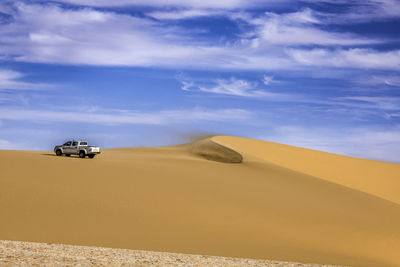 Scenic view of desert against sky