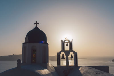 Scenic view of sea against clear sky during sunset