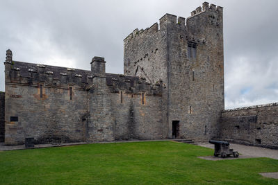 View of historic building against cloudy sky