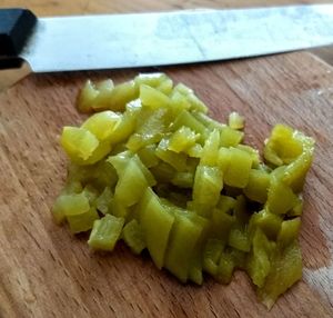 High angle view of chopped vegetables on cutting board