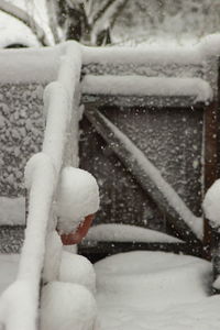 Close-up of snow on person during winter