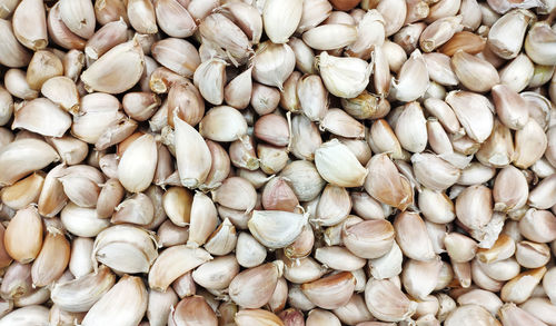 Full frame shot of garlic for sale at market