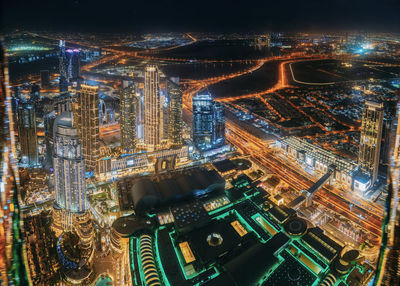 High angle view of illuminated cityscape at night