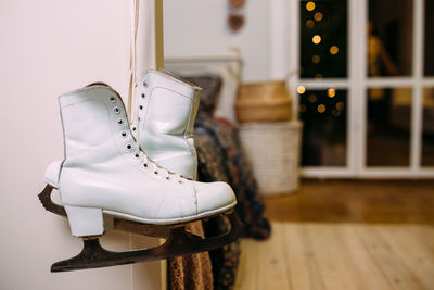 White womens retro ice skates at home for christmas