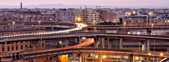 High angle view of illuminated cityscape at night